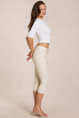 Mid-Rise Capri Jeans in Ivory