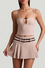 Belted Low-Rise Pleated Mini Skirt in Mushroom