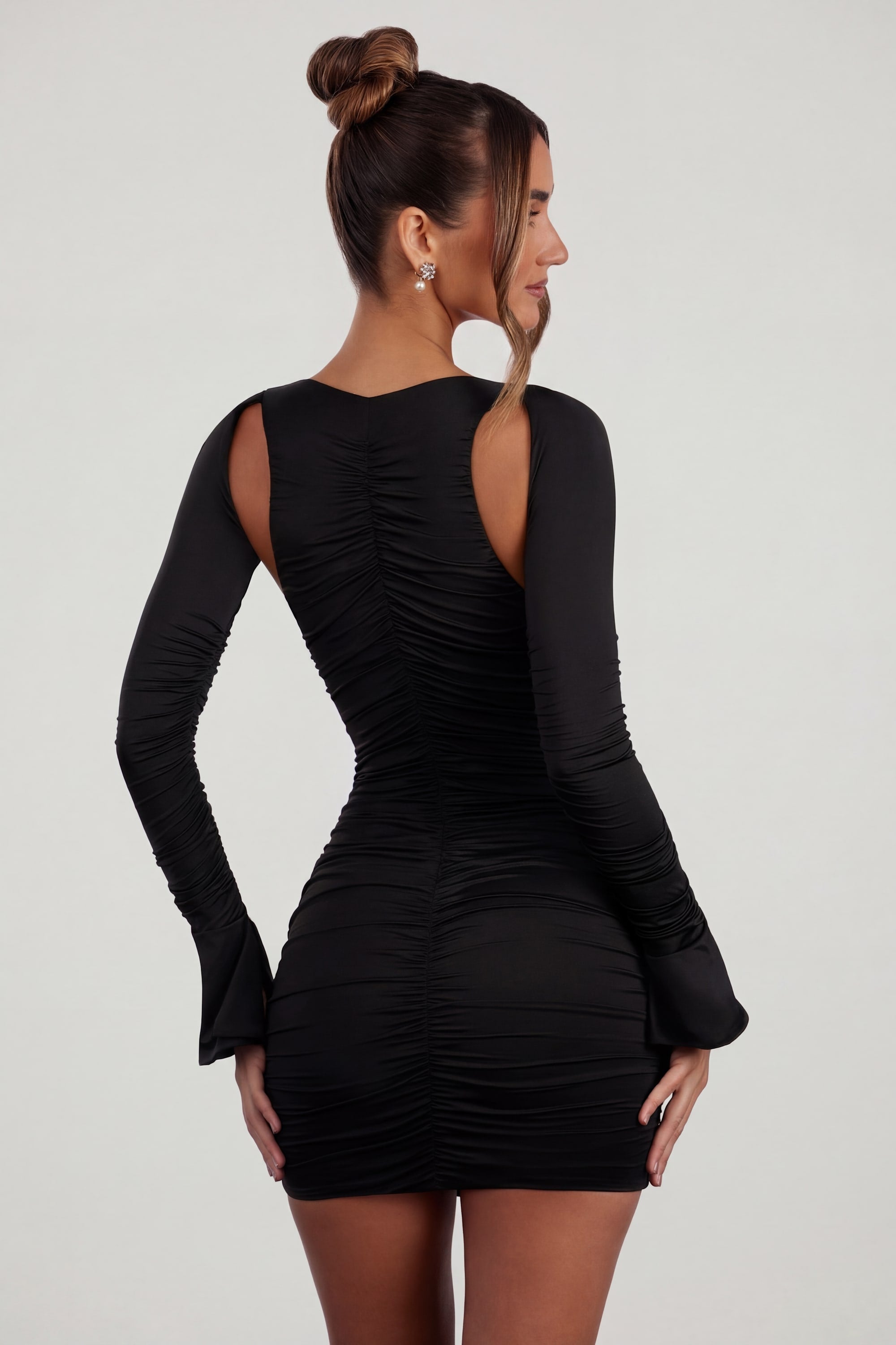 Low Plunge Ruched Mini Dress in Black