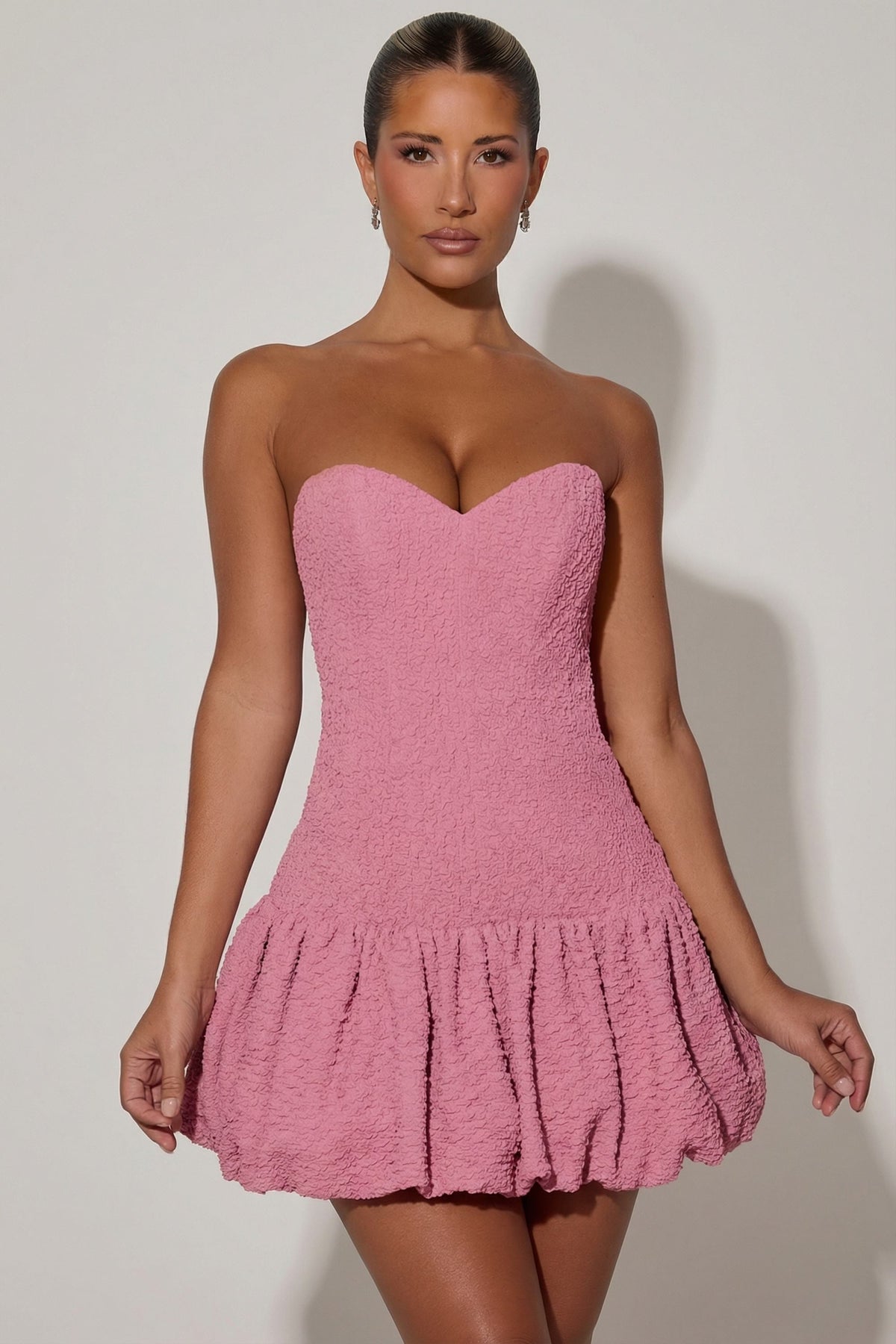 Cut-Out Bubble Hem Corset Mini Dress in Dusty Pink