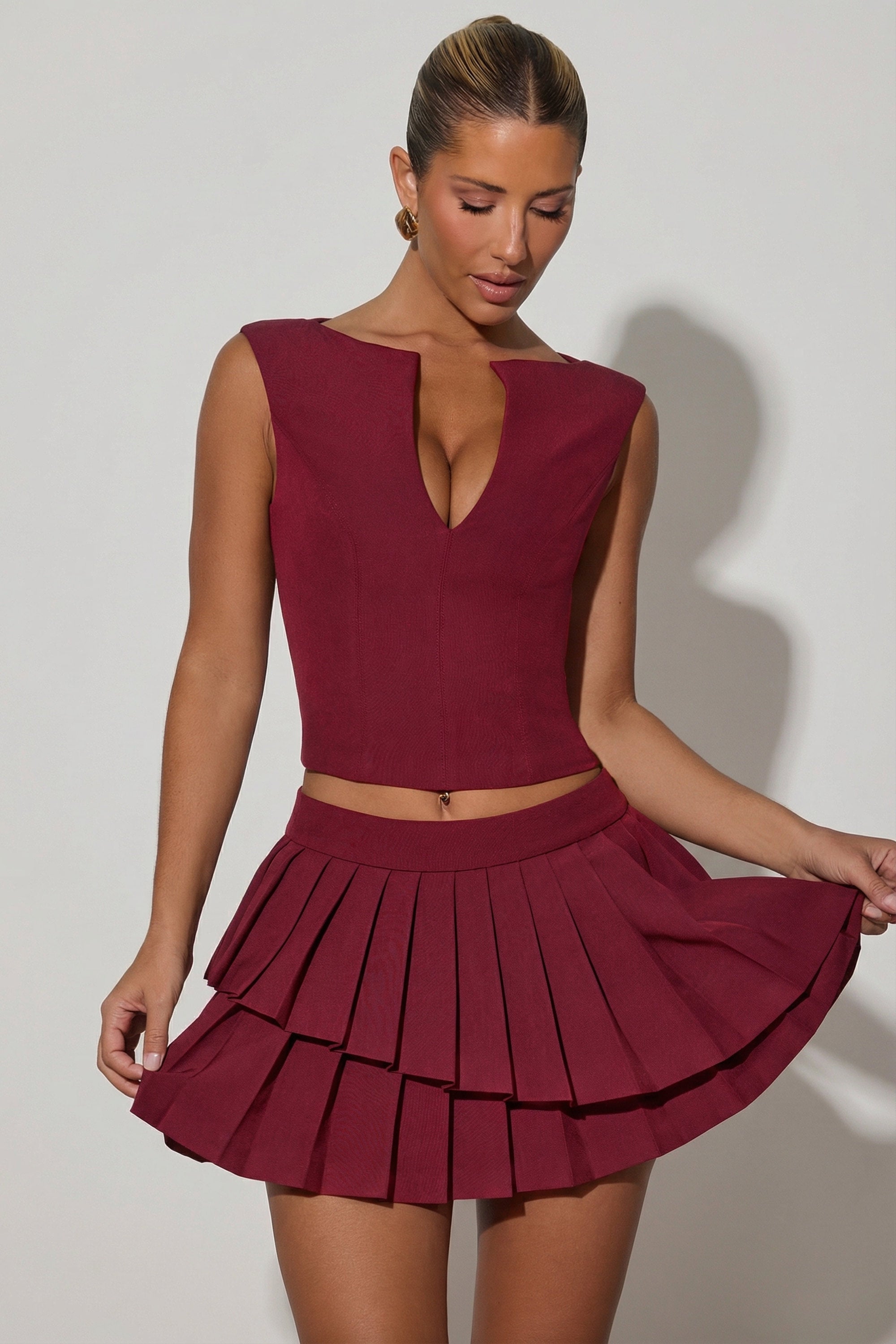 Layered Pleated Low-Rise Mini Skirt in Wine Red