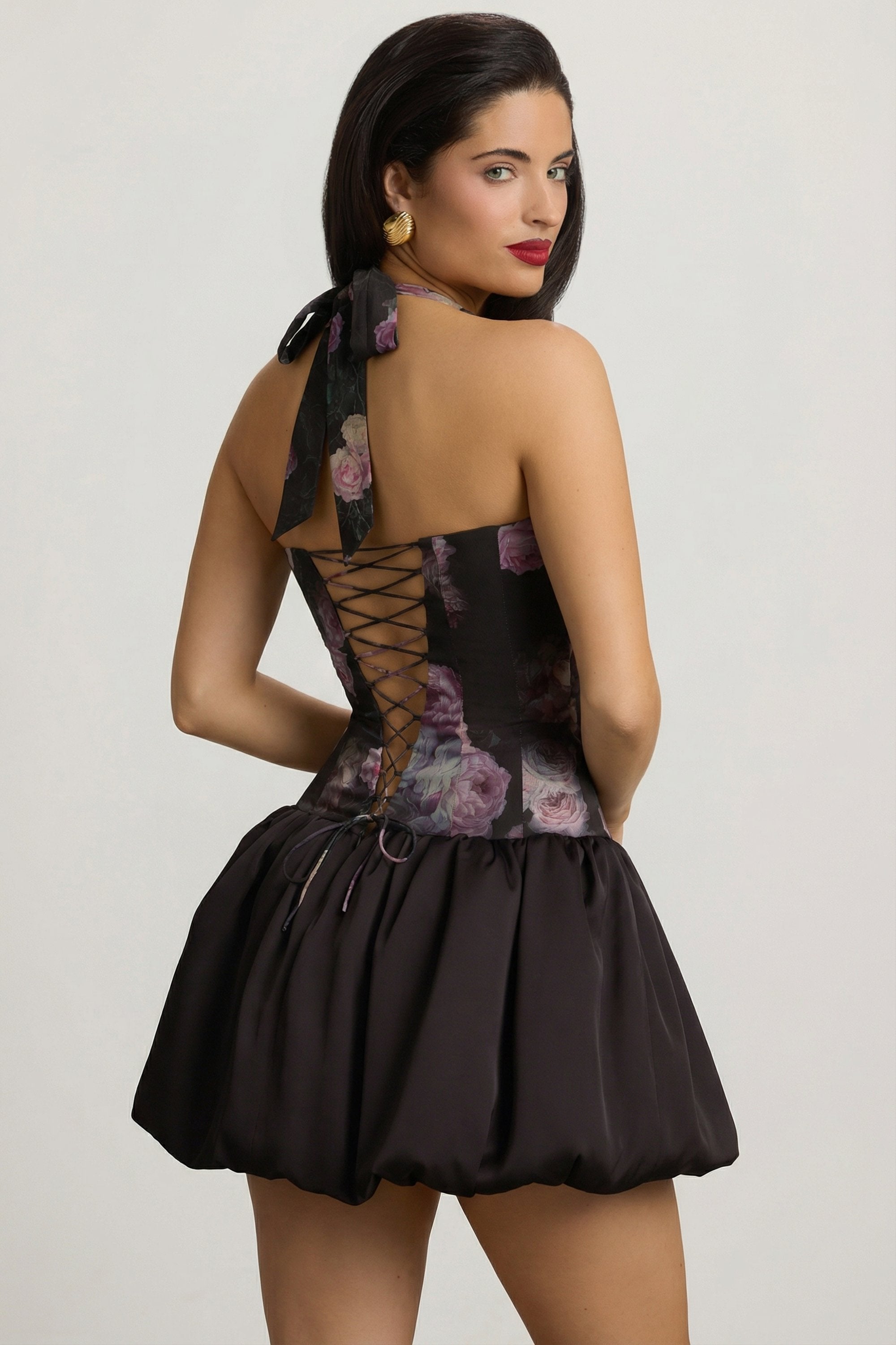 Halterneck Lace-Up Bubble Hem Mini Dress in Black Floral Print
